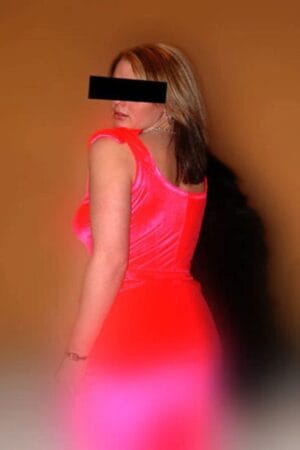 Edinburgh escort in bright pink dress