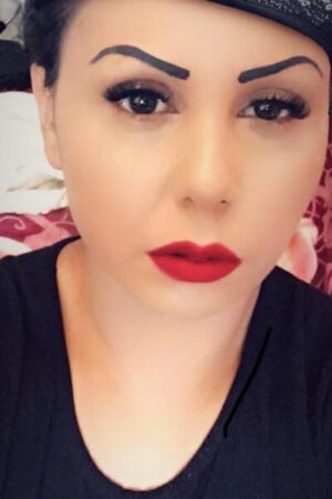 Leeds escort in red lipstick