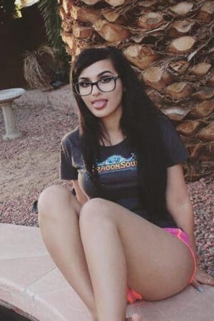 Patricia Petite Fit London Escort sticks out her tongue