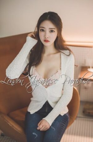 Lucy Taiwanese London Agency Escort staring at the camera