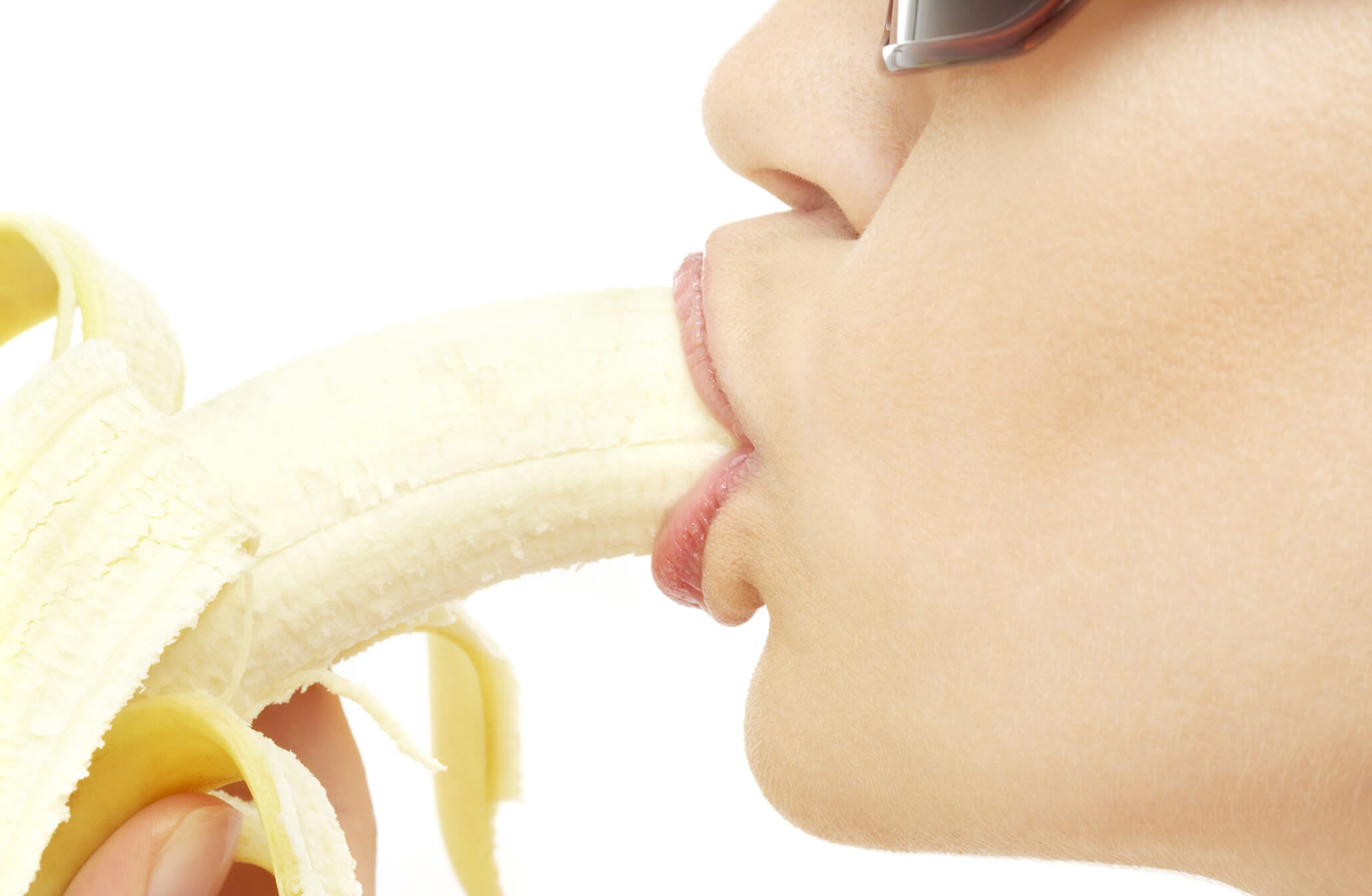 girl simulating oral with a banana