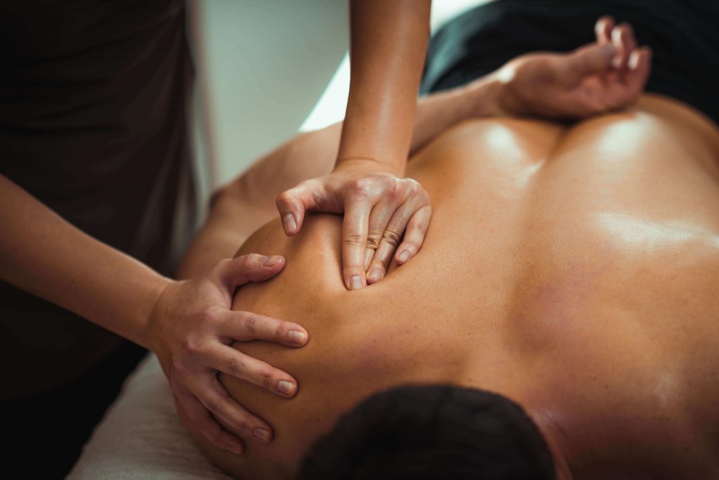 man receiving a shoulder massage