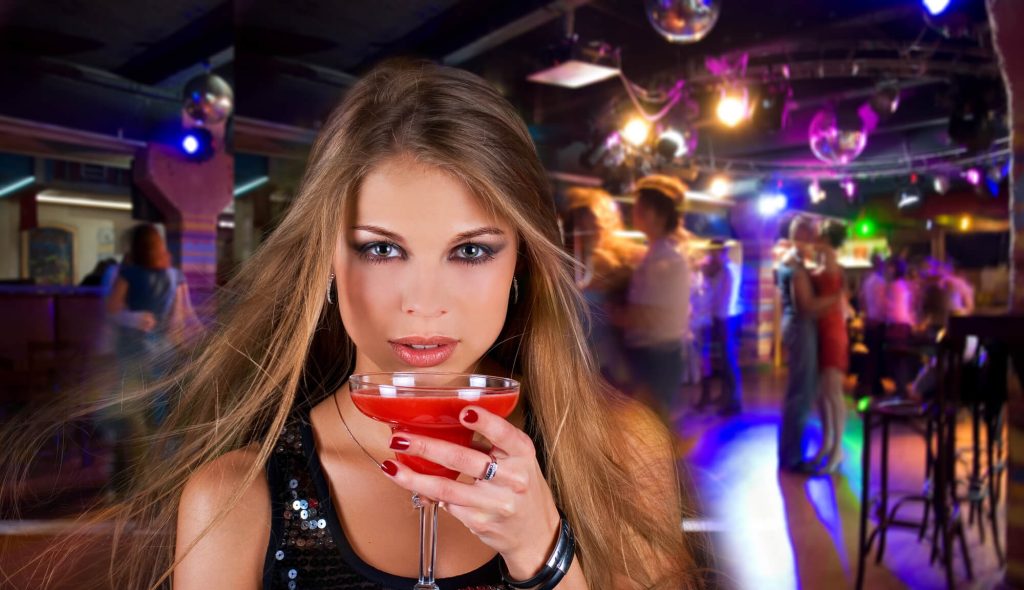 sexy chick drinking a cocktail