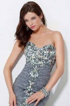 brunette Edinburgh escort in sparkly silver and grey dress