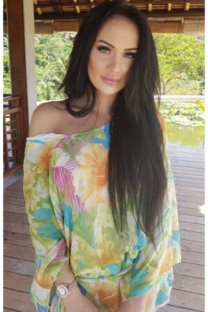 Karla South American London Escort wearing flowery dress
