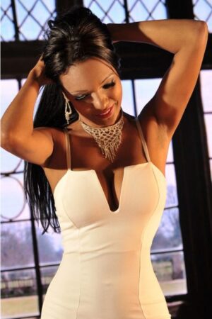 Dublin escort holding her hair up and looking sexy