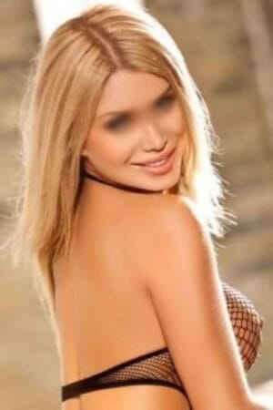 smiling dublin blonde escort showing amazing breasts