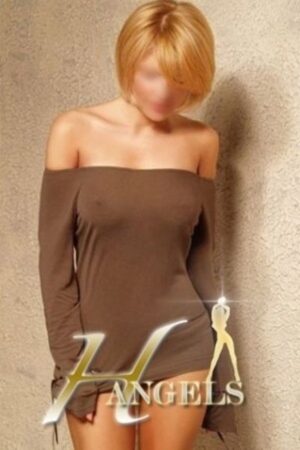 Bournemouth escort with off the shoulder top looking sexy