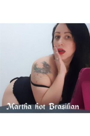 Brazilian escort in Inverness showing of her shoulder tattoo