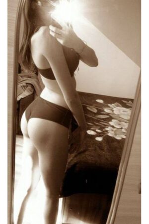 Birmingham escort takes a selfie of her pert butt