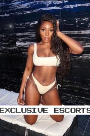 Ebony Surrey escort in white bikini