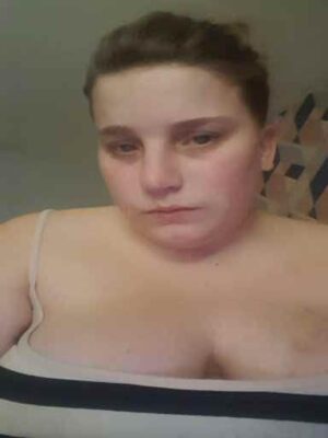 Curvy Newcastle escort posing with a pouty face