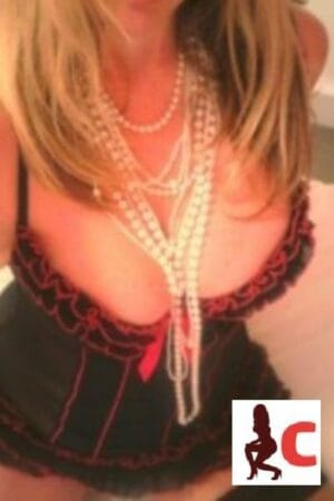 busty blonde Carmarthenshire Escort in black bustier