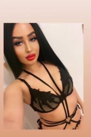gorgeous young OWO London Escort with pouty red lips