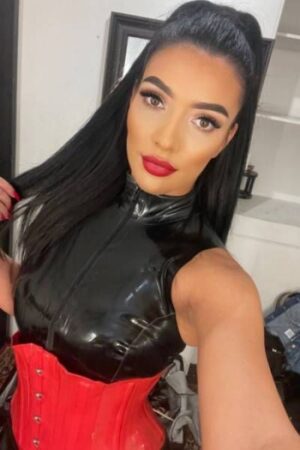 Sexy London Mistress in a red corset