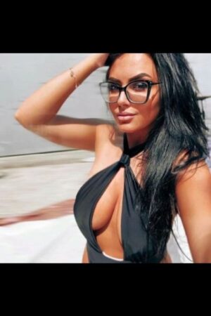 black haired Stirling escort wearing glasses