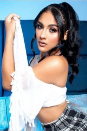 exotic Gloucester escort taking off shirt