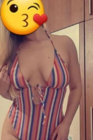 Independent Huddersfield escort in a stripey bathing suit