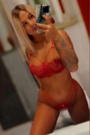 beautiful young Wakefield escort in red bra selfie