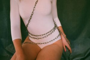Sexy escort in chains