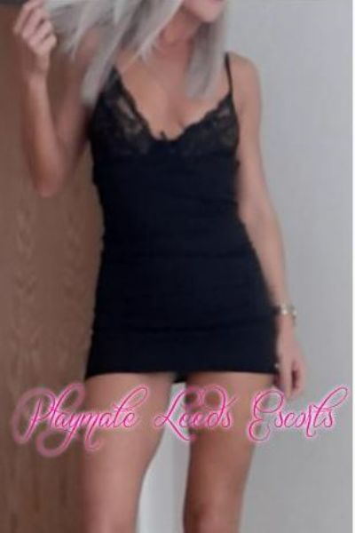 platinum haired Leeds escort in black sexy lingerie