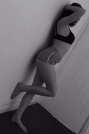 young Bolton escort in running shorts