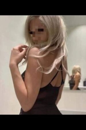 blonde Aldershot escort teasing the camera