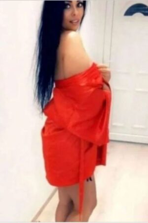 long black haired Blackburn escort in red robe