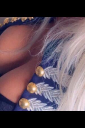 close up of blonde Leeds escort's boobs