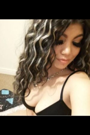 curly haired young Northampton escort