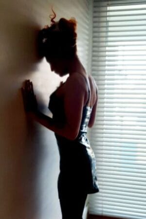 silhouette of Cardiff escort against the wall