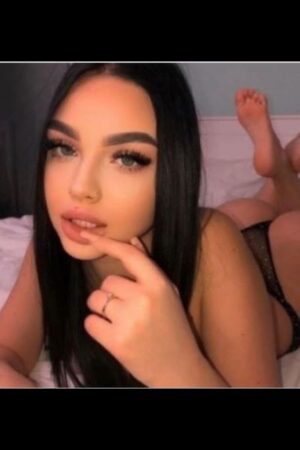 young Swindon escort with her finger in mouth