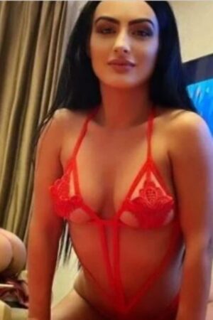 raven haired Portsmouth escort in red lingerie