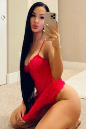 pouting Oxford escort taking a selfie