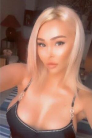 gorgeous blonde Portsmouth escort showing her cleavage