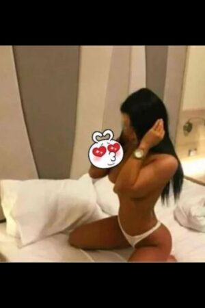 dark long haired Belfast companion posing topless