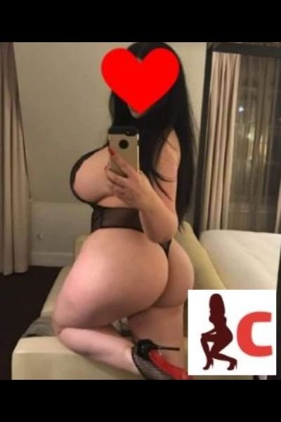 busty escort takes pic of her own ass