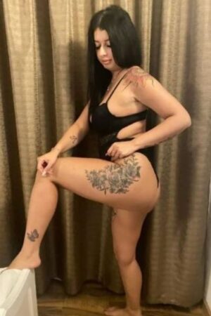 ankle and thigh tattooed Stirling companion