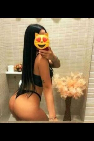 sexy Newport companion posing in bathroom