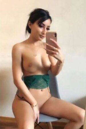 exotic dark haired Bradford Escort posing topless