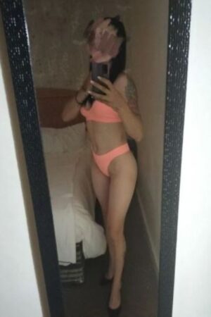 Tattooed Coventry escort taking a selfie