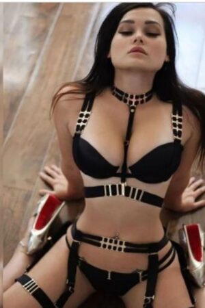 Derby escort in strappy black outfit