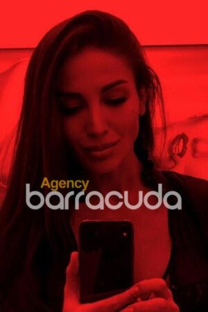 Russian Escort in London playing on her phone