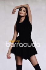 Russian Escort in London in a black dress