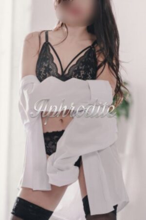 Monmouthshire escort wearing button down business shirt