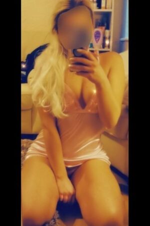 blonde Birmingham escort takes a selfie