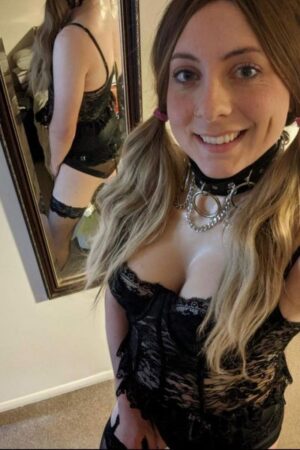 Blonde London Escort in a dog collar