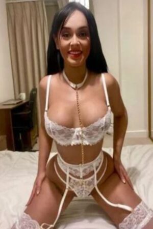 Brunette Llanelli Escort in white lingerie