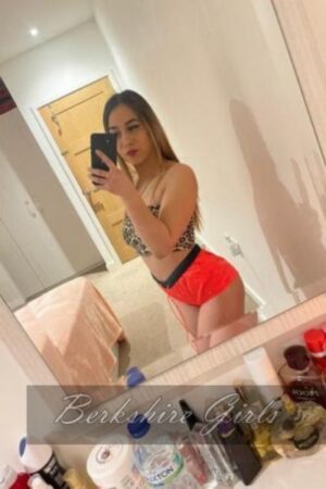 Slim party girl Surrey escort Mel taking a selfie