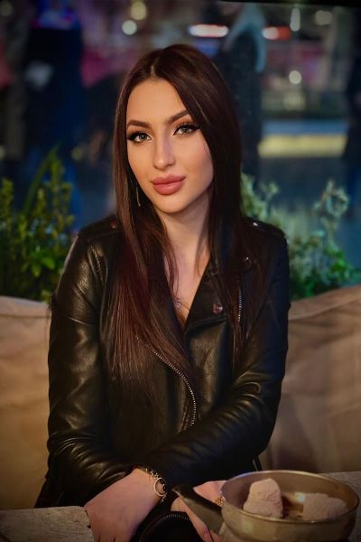 Rebecca Young Brunette Surrey girl in a leather jacket